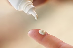 Drop of cream from a tube - vagina tightening drying